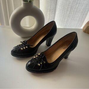MICHAEL Michael Kors Black Heels with Gold Eyelets